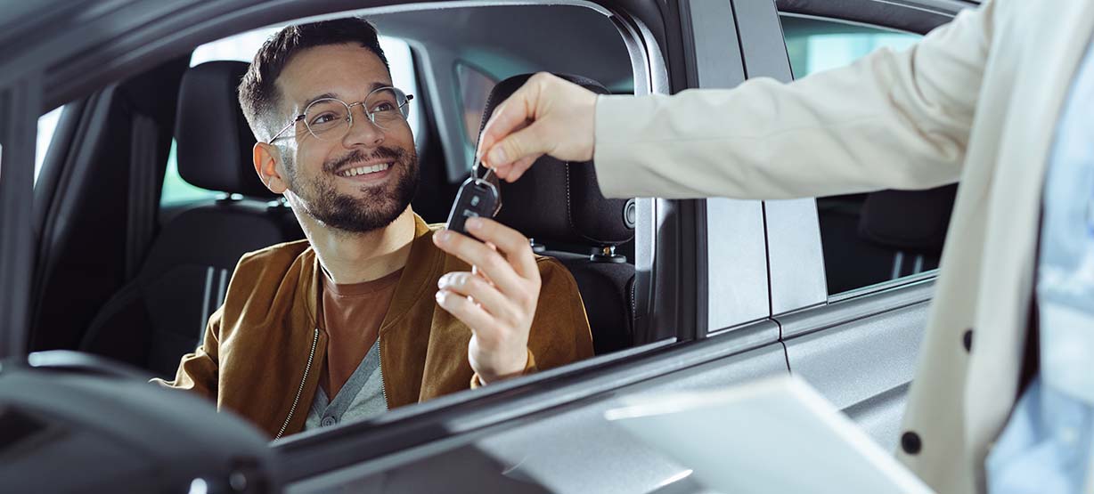 men renting a car
