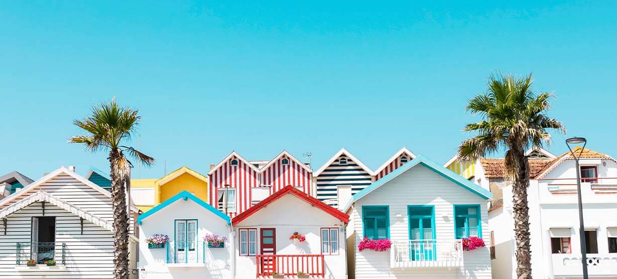 Best beaches in Portugal: colored striped house costa nova 