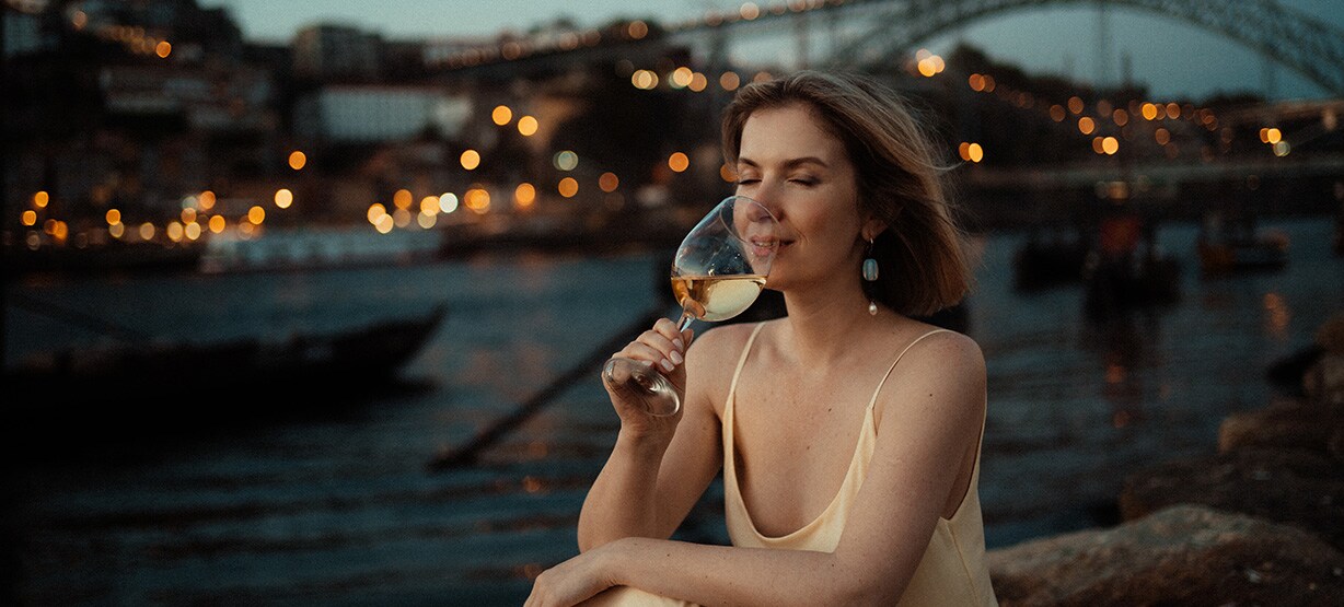 woman drinking wine at night Porto